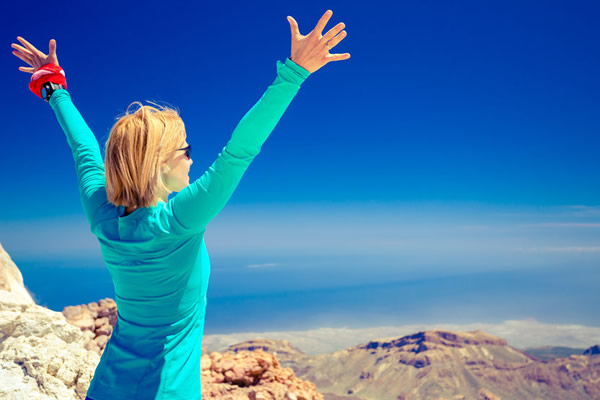 Woman with arms outstretched